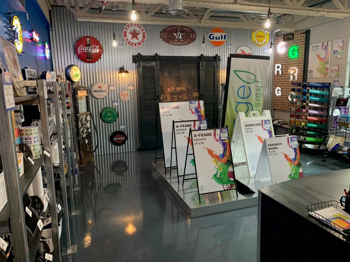 Showroom with A-frame signs and collectable wall signs